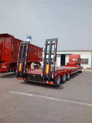 三橋凹梁托盤車載重60噸低平板運輸車行情與轉運應用分析